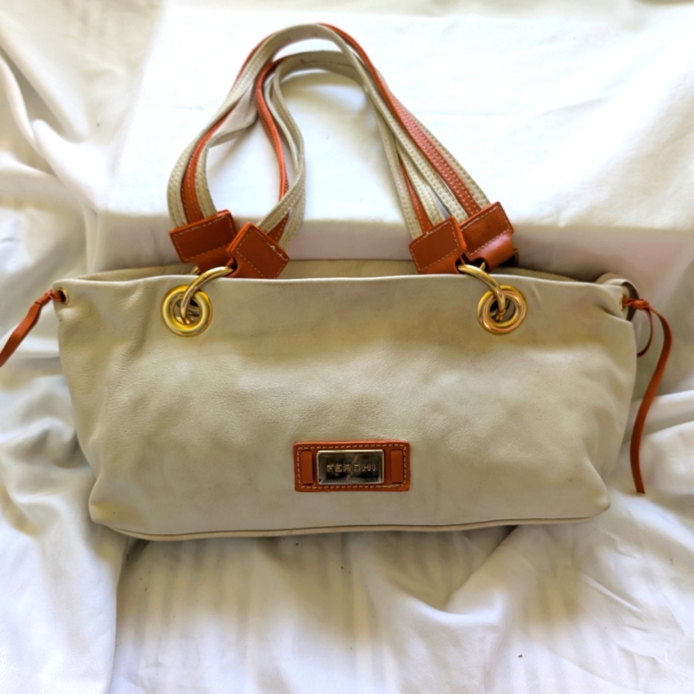 FERCHI.  Sodt Leather Cream and Orange Shoulder Bag with Gold Accents